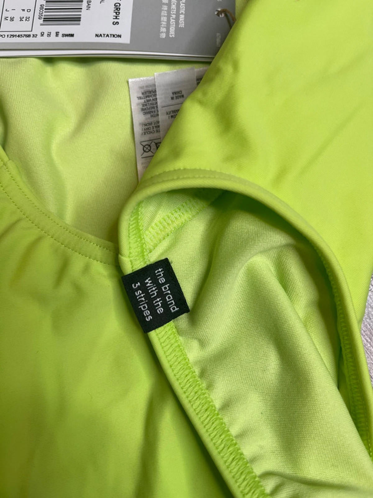 Adidas Green Natureef graphic swimsuit women’s size 28’’